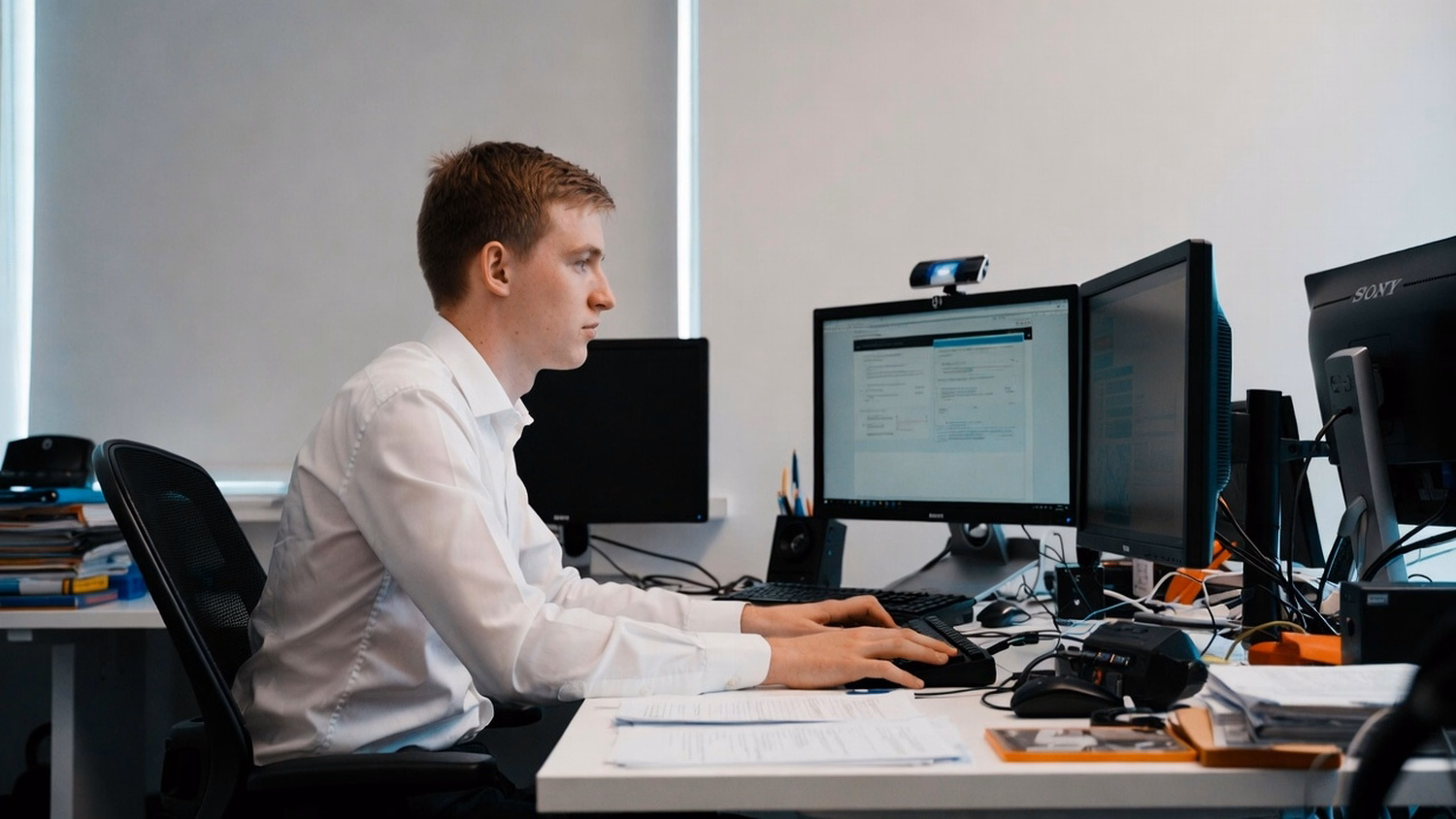 IT professional working at a desk on tasks related to MSP Near Me: Best