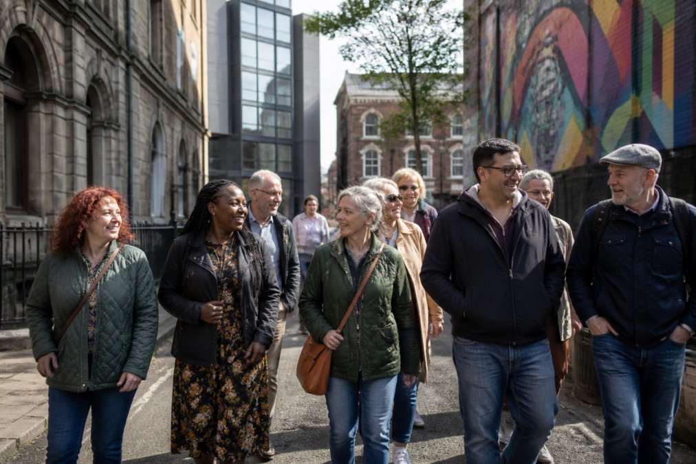 Professional illustration showing street and diverse and group concepts for walking tours locals