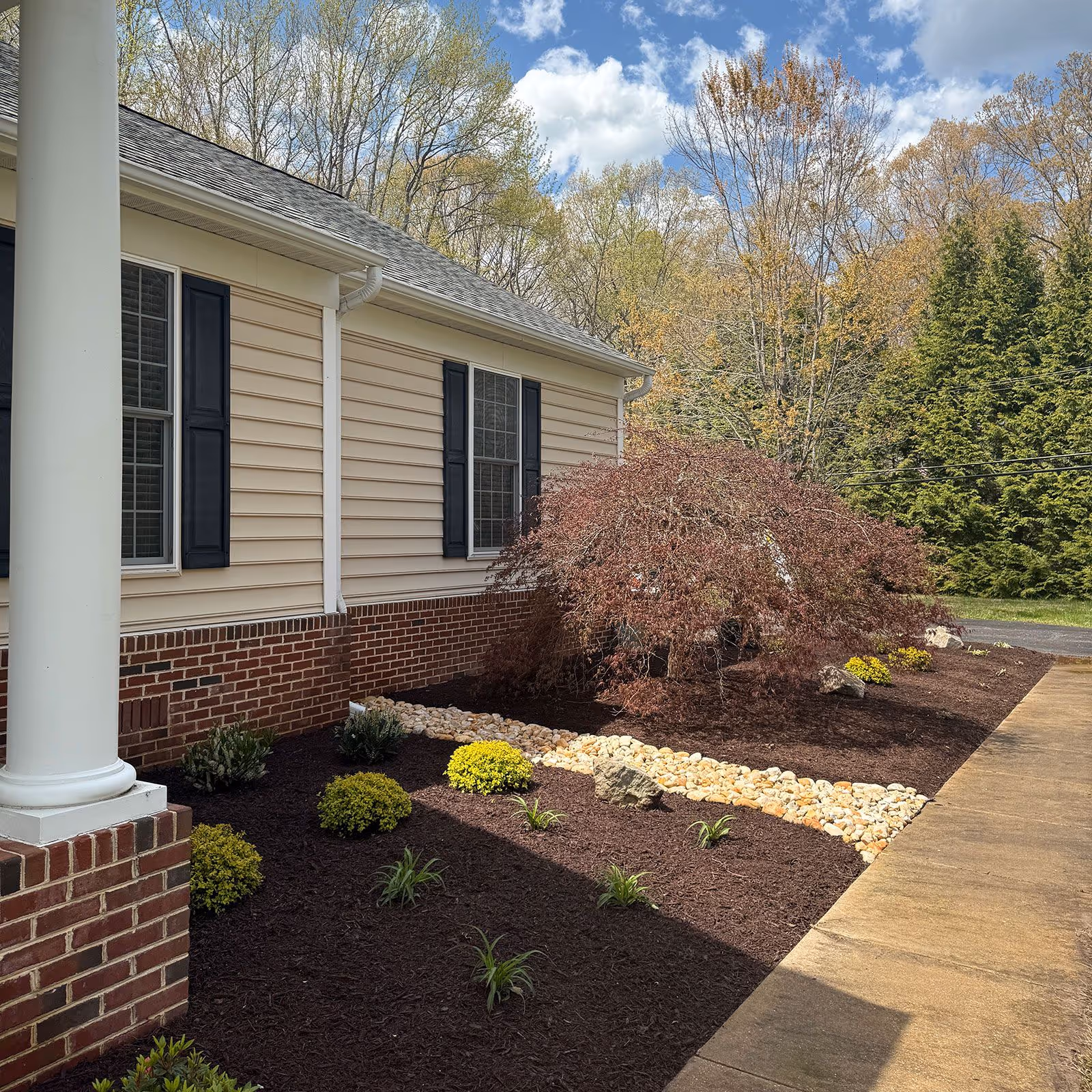 New mulch installation by Larsen's Lawn and Landscape.