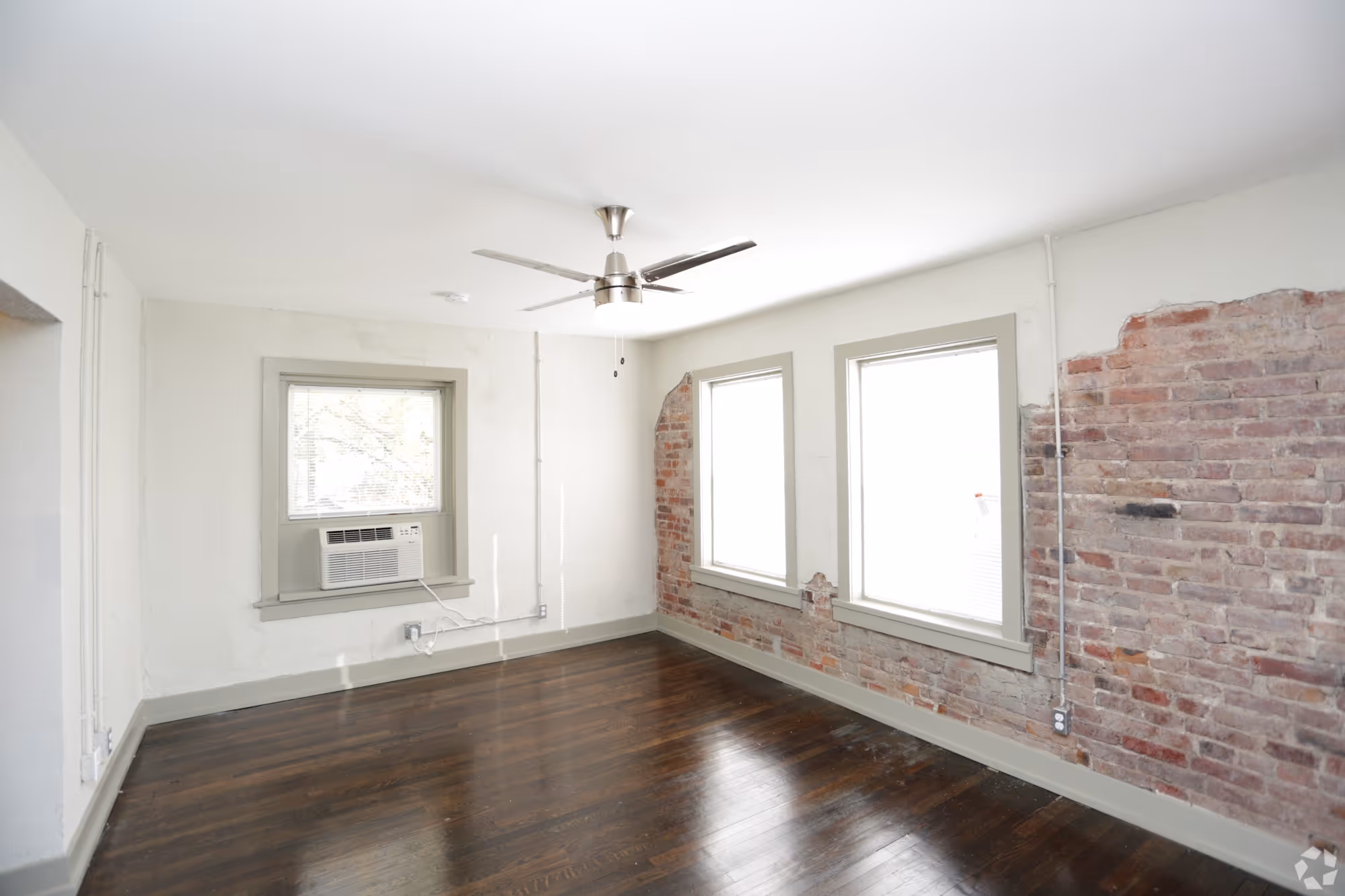 bedroom with exposed brick