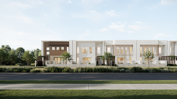Modern two-story residential townhouses with mixed facade textures and front landscaping under a partly cloudy sky.