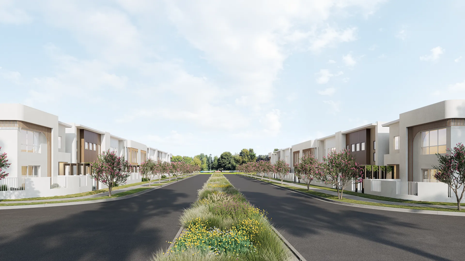 Row of modern two-story townhouses with garages, large windows, trees, and green lawn in front under a blue sky.