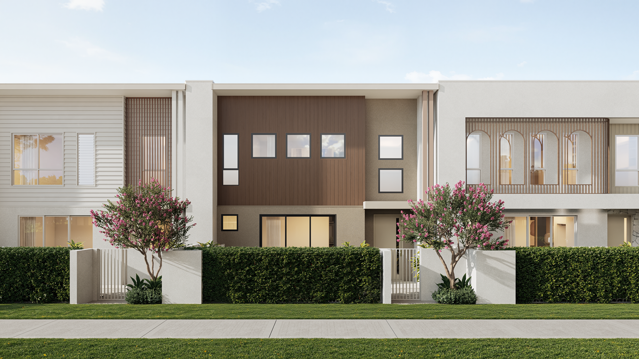 Street view of modern two-story townhouses with landscaped front yards and a sidewalk under a partly cloudy sky.