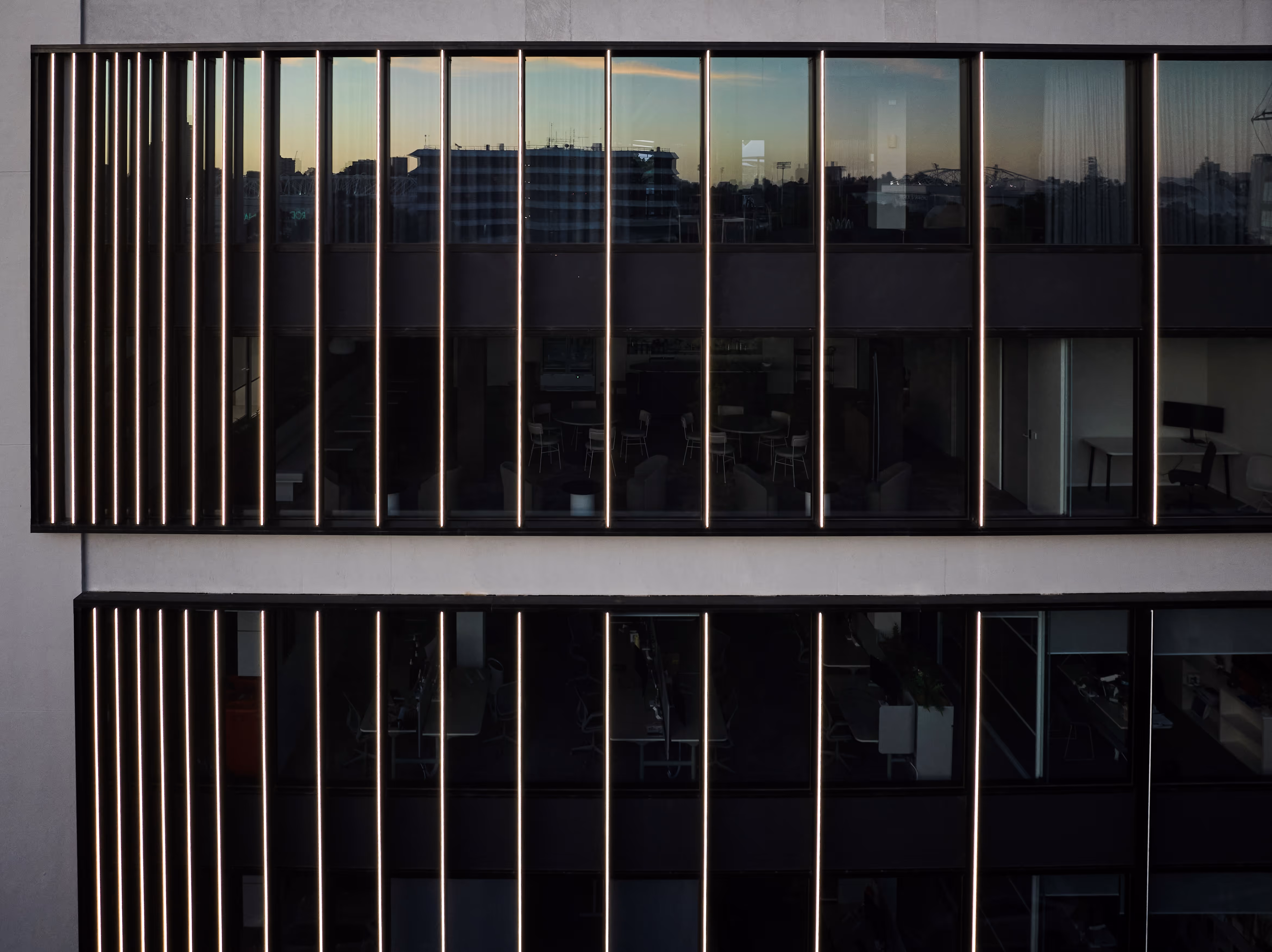 Architectural photography taken by Vladimir Malyavko of a curved glass facade building in Moscow.