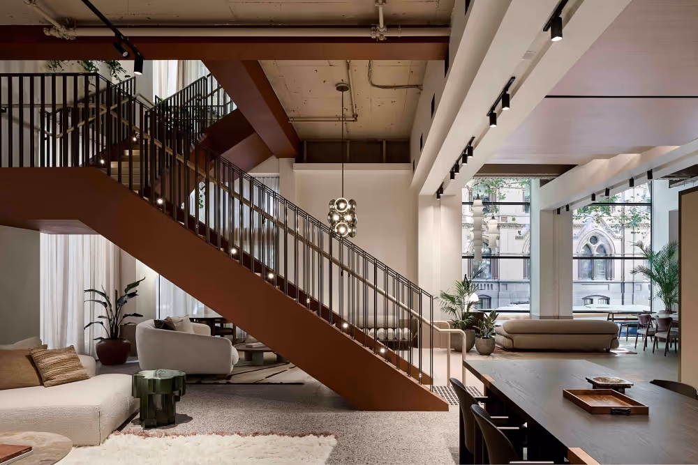 Ah Ket Chambers photo taken by Elise Scott, showing an indoor plant garden in a modern workplace setting.