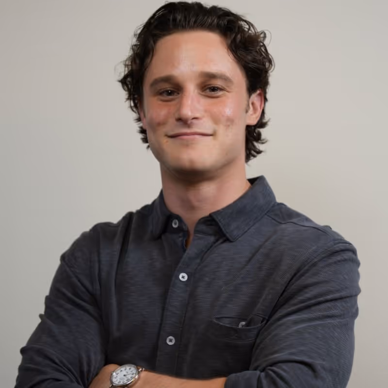 A color portrait photograph of Danny Smith