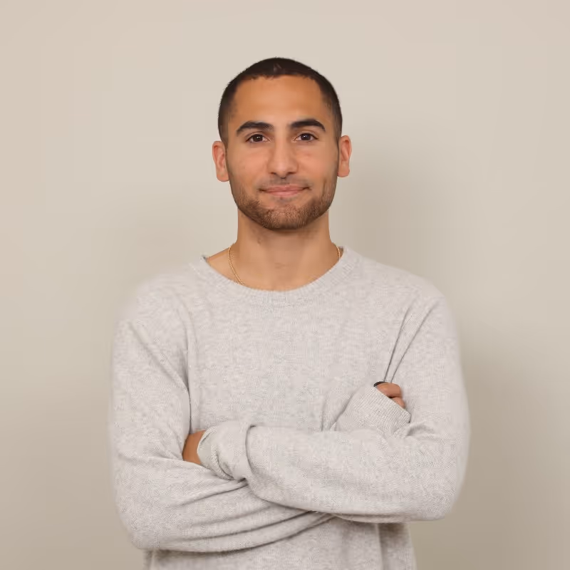 A color portrait photograph of Zach Schofel