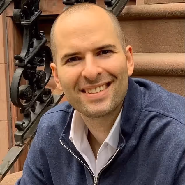 A color portrait photograph of Ben Zises