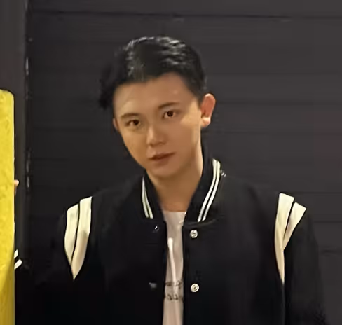 A color portrait photograph of Kevin Chen