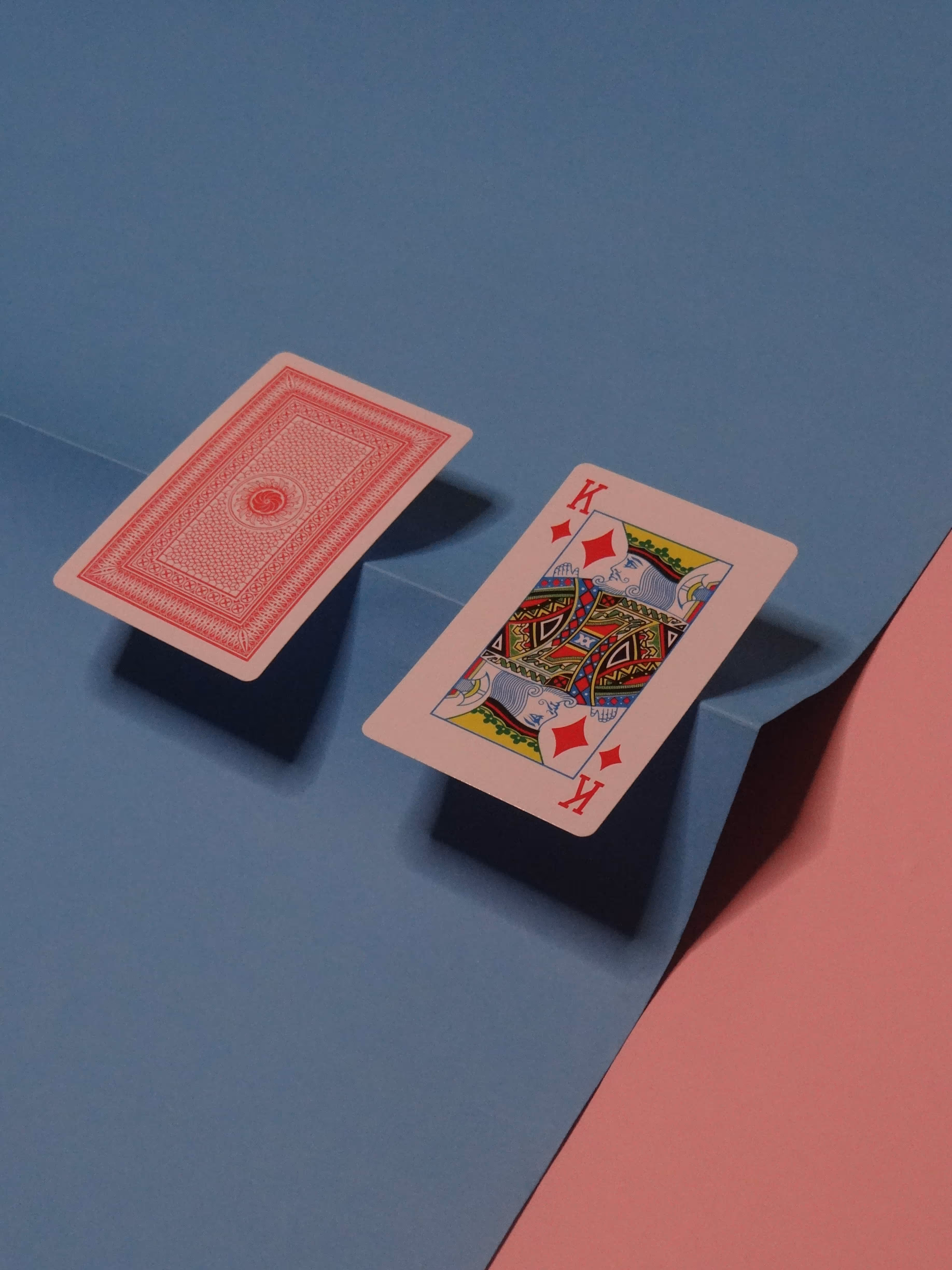 `Hi-Tech Gold deck showcasing the intricate back design alongside the Ace of Spades, highlighting its fine detailing & modern elegance.