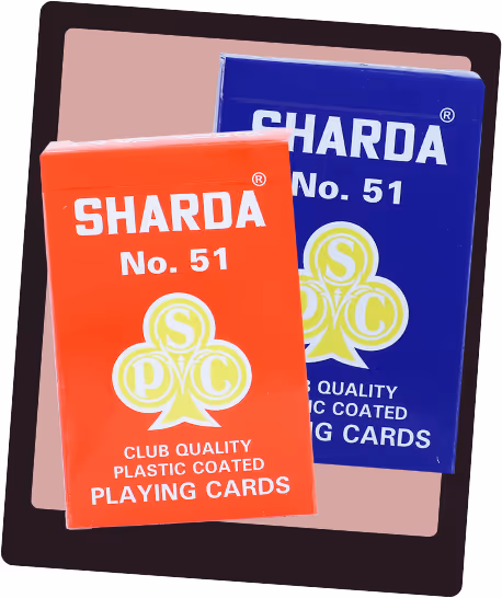 Red and blue Sharda No. 51 tuck boxes placed side by side, highlighting their simple, heritage-inspired design and crisp typography.