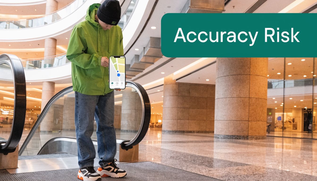 A person in a shopping mall looking at a digital map on their smartphone screen.