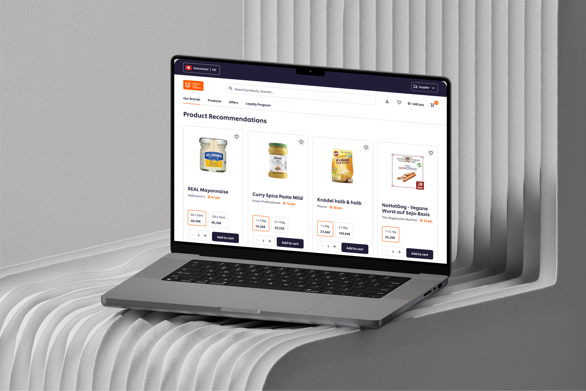 Open laptop showing Unilever Food solutions online store created on Shopify with product recommendations for food items and prices.