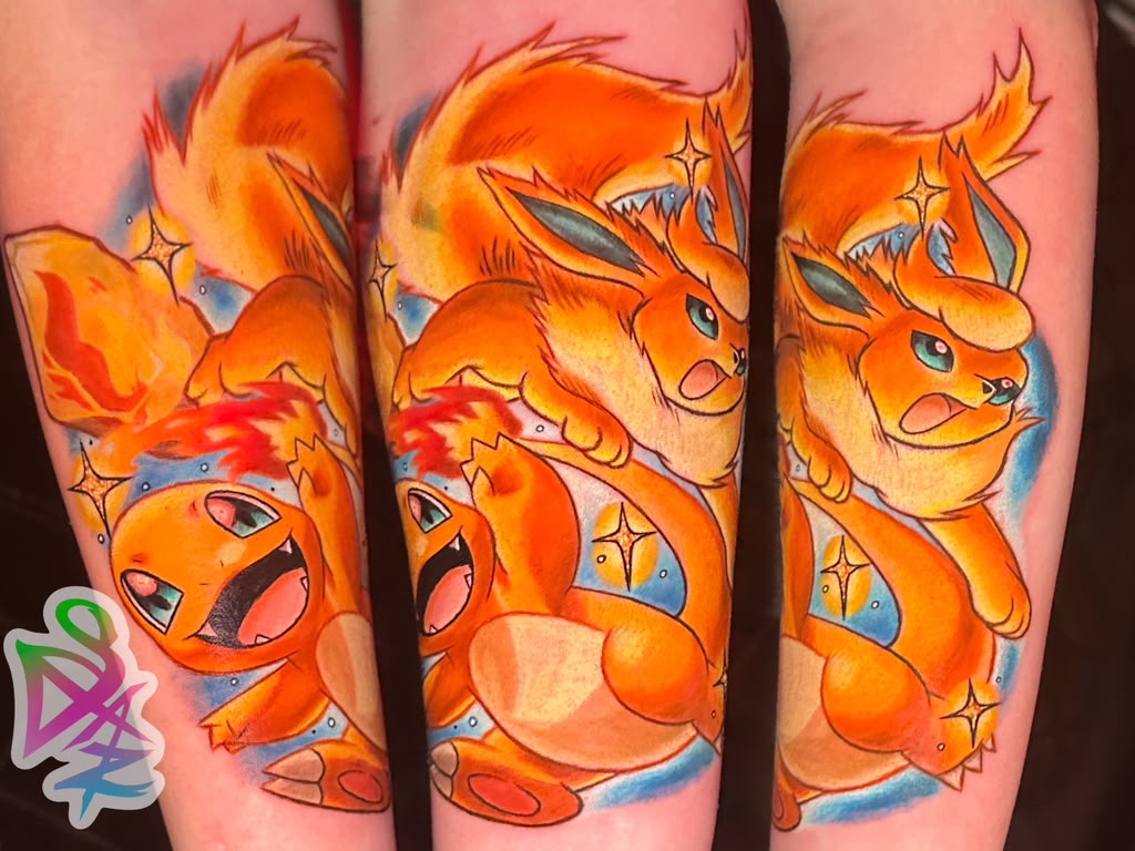 Colorful Pokemon Flareon and Charmander tattoo by Jasmyn SweetJaz at Santana Studio Co, Fort Worth