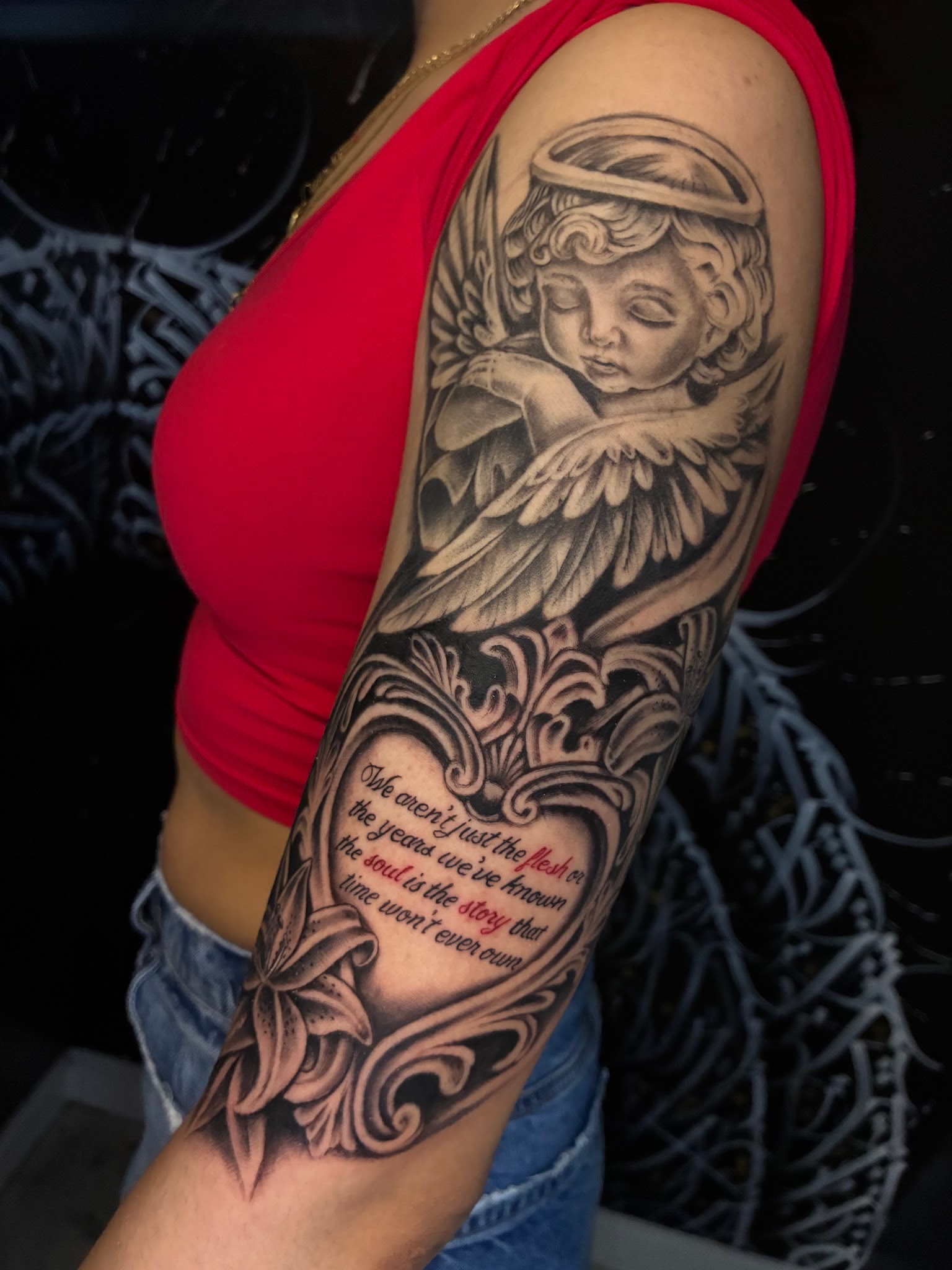 Black and grey cherub angel and ornate script heart half sleeve tattoo by Jessica, Fort Worth tattoo artist
