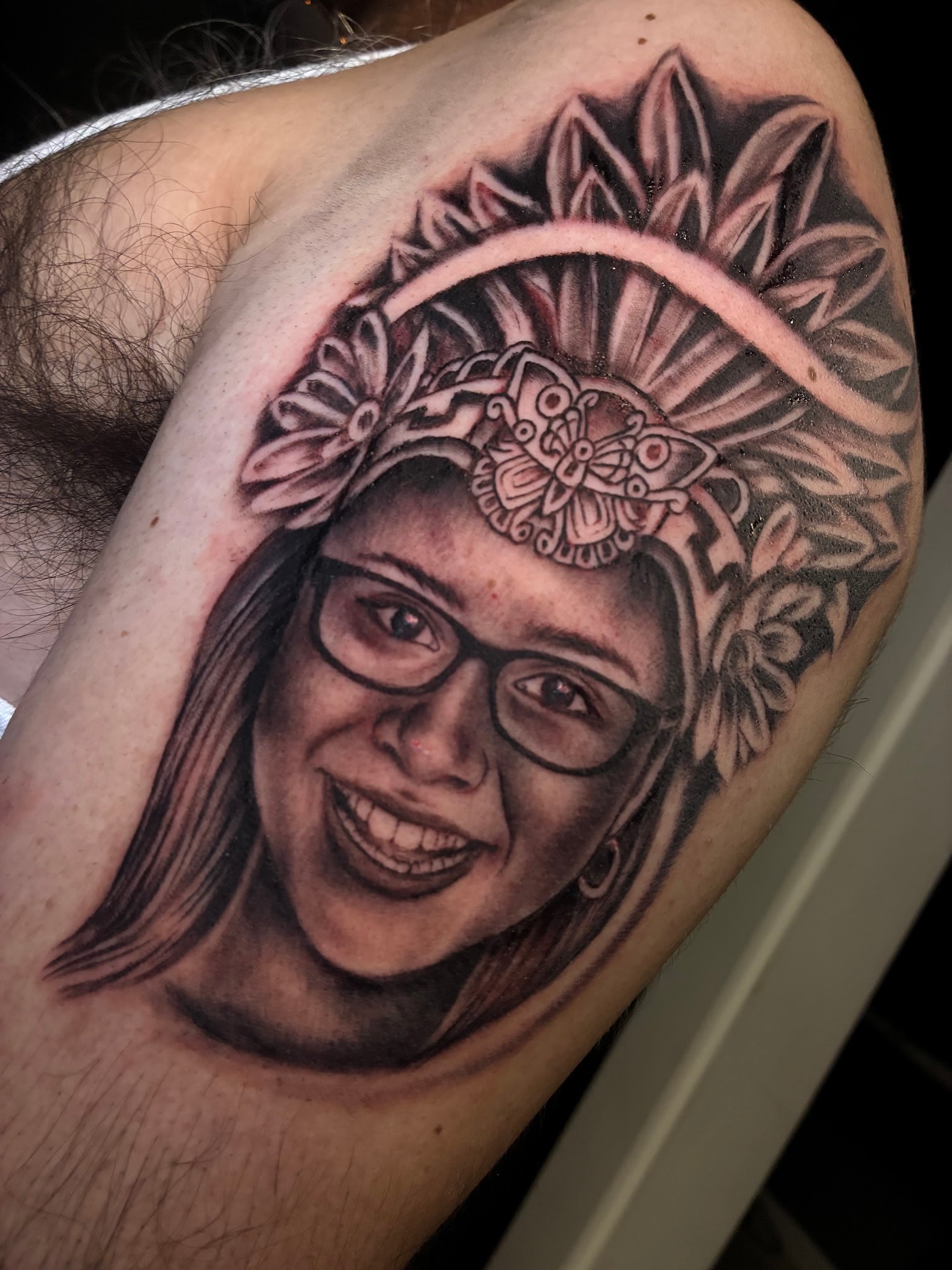 Realistic black and grey portrait tattoo with Aztec headdress by Jessica, Fort Worth tattoo artist