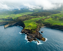 Green volcanic coastline in the Azores