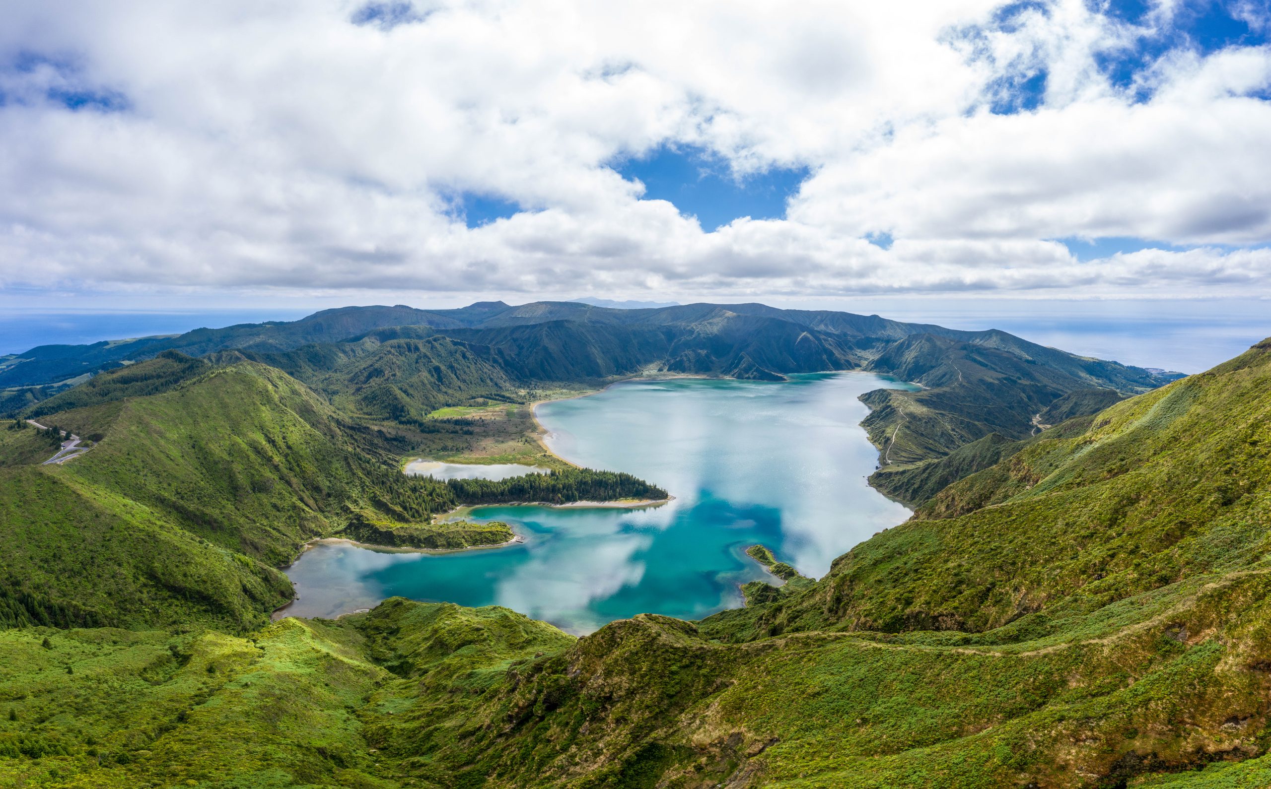 Lagoa do Fogo crater lake surrounded by green hills in the Azores