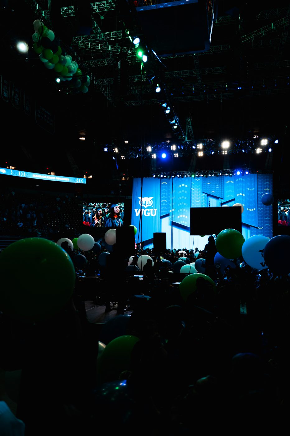 Commencement stage with balloon drop and stage lighting