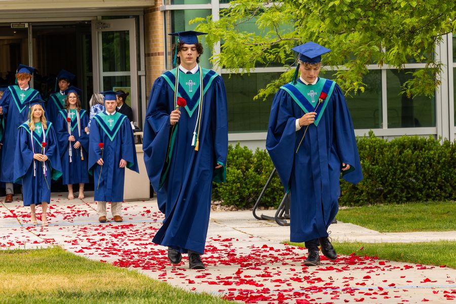 Juan Diego graduates in the outdoor rose-petal processional