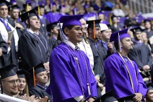 Weber State graduates in purple gowns