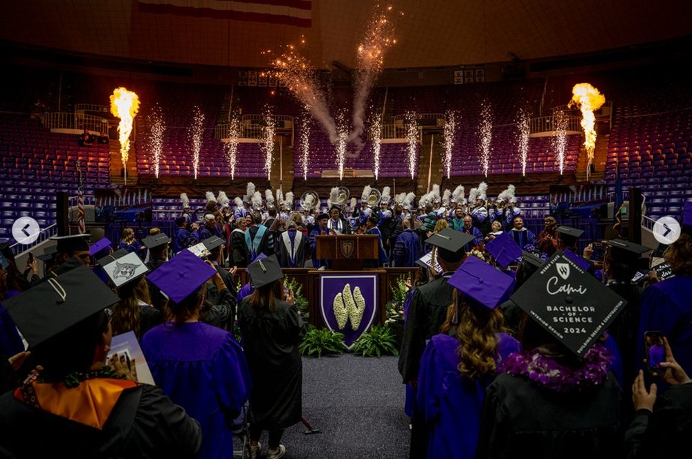 Pyrotechnics and marching band during a Weber State commencement