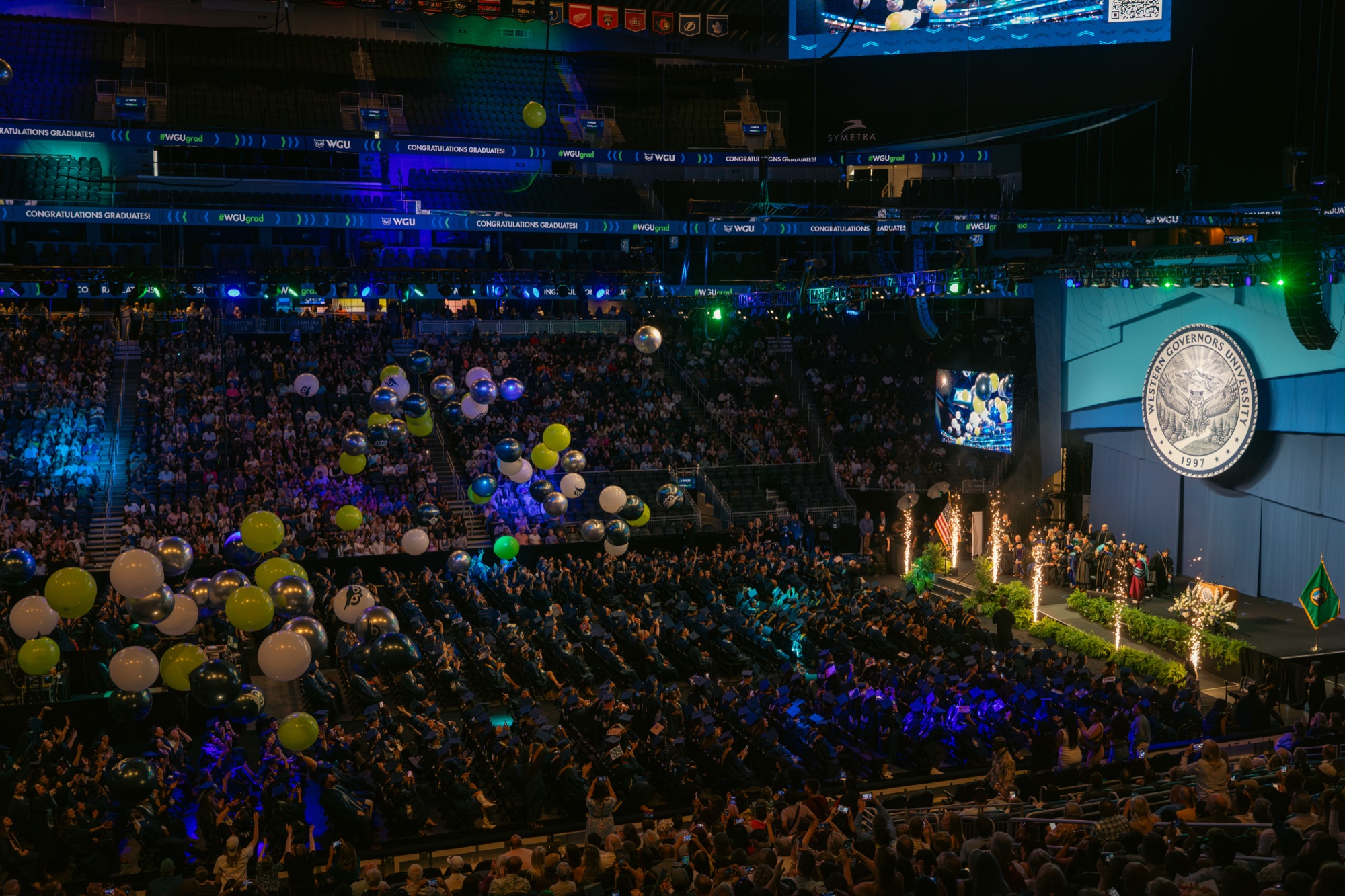 Commencement stage with balloon drop and stage lighting