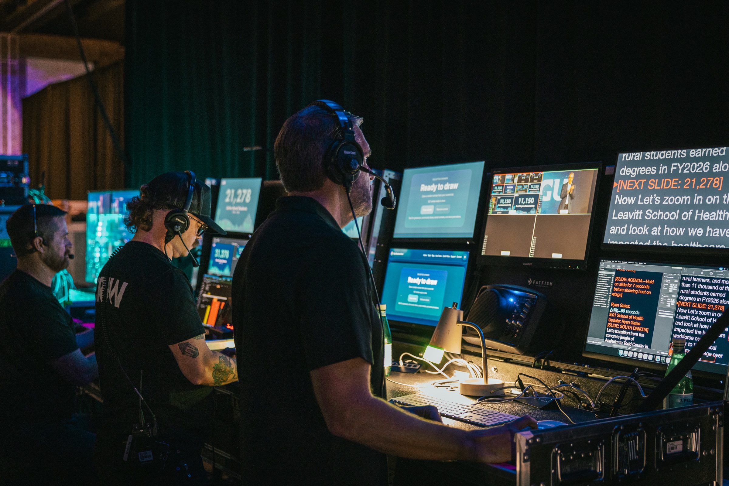 Show caller and graphics operators running teleprompter and live audience screens