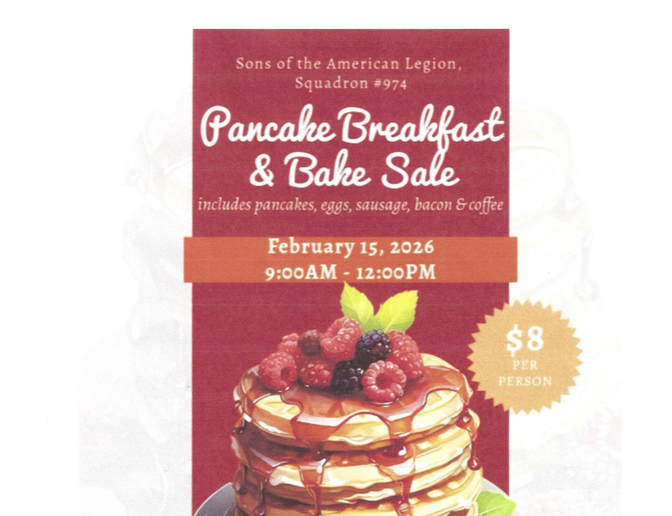 Stack of pancakes topped with syrup, raspberries, blackberries, and blueberries at the Sons of the American Legion Squadron #974 Pancake Breakfast & Bake Sale on February 15, 2026.