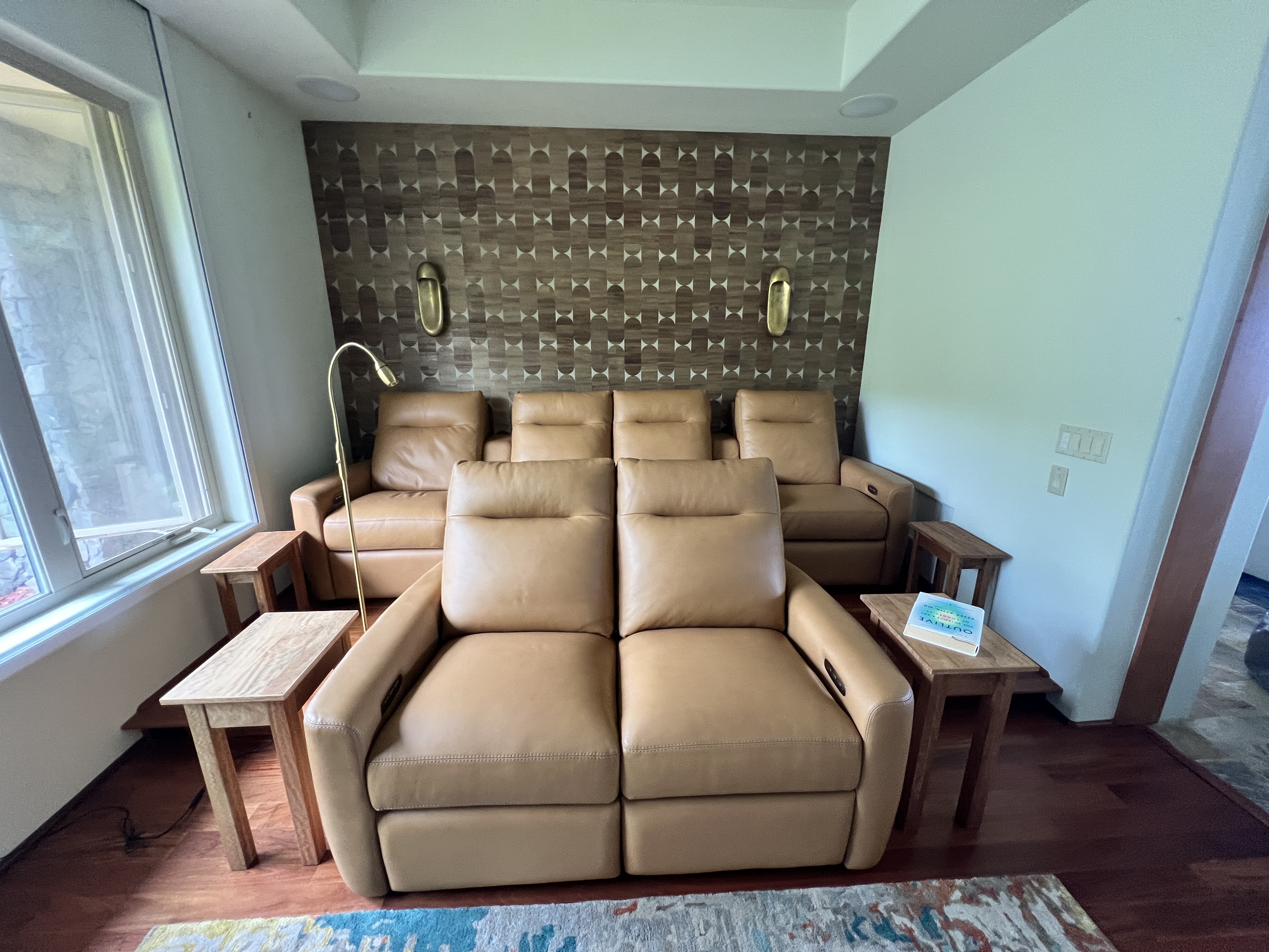 Custom installed wallpaper accent wall in a Maui home living room
