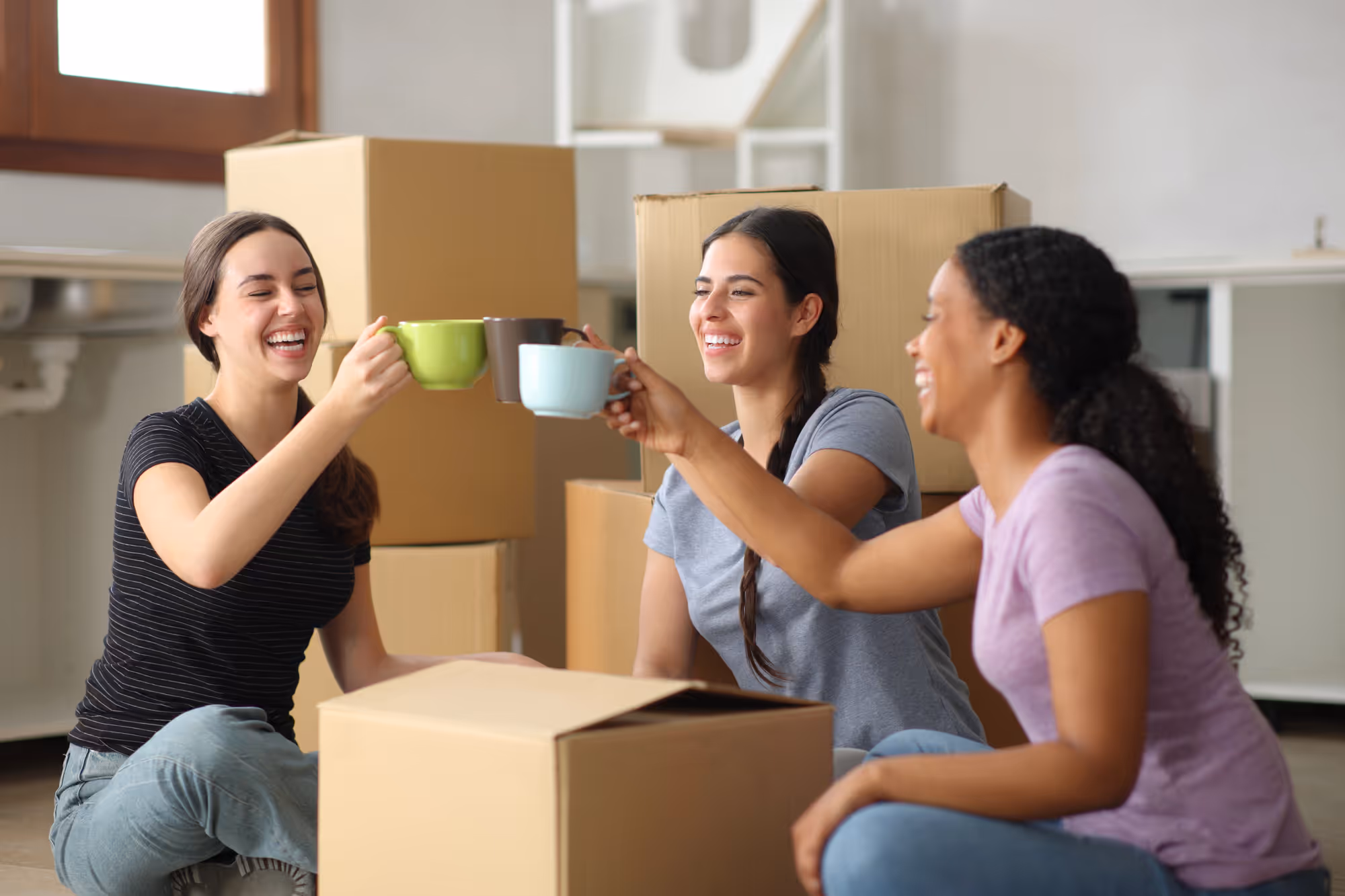 Happy tenants celebrating after a successful tenant screening by BSO Real Estate in Dubai. Smiling tenants enjoying their new home after BSO Real Estate’s seamless tenant screening and placement services in Dubai.