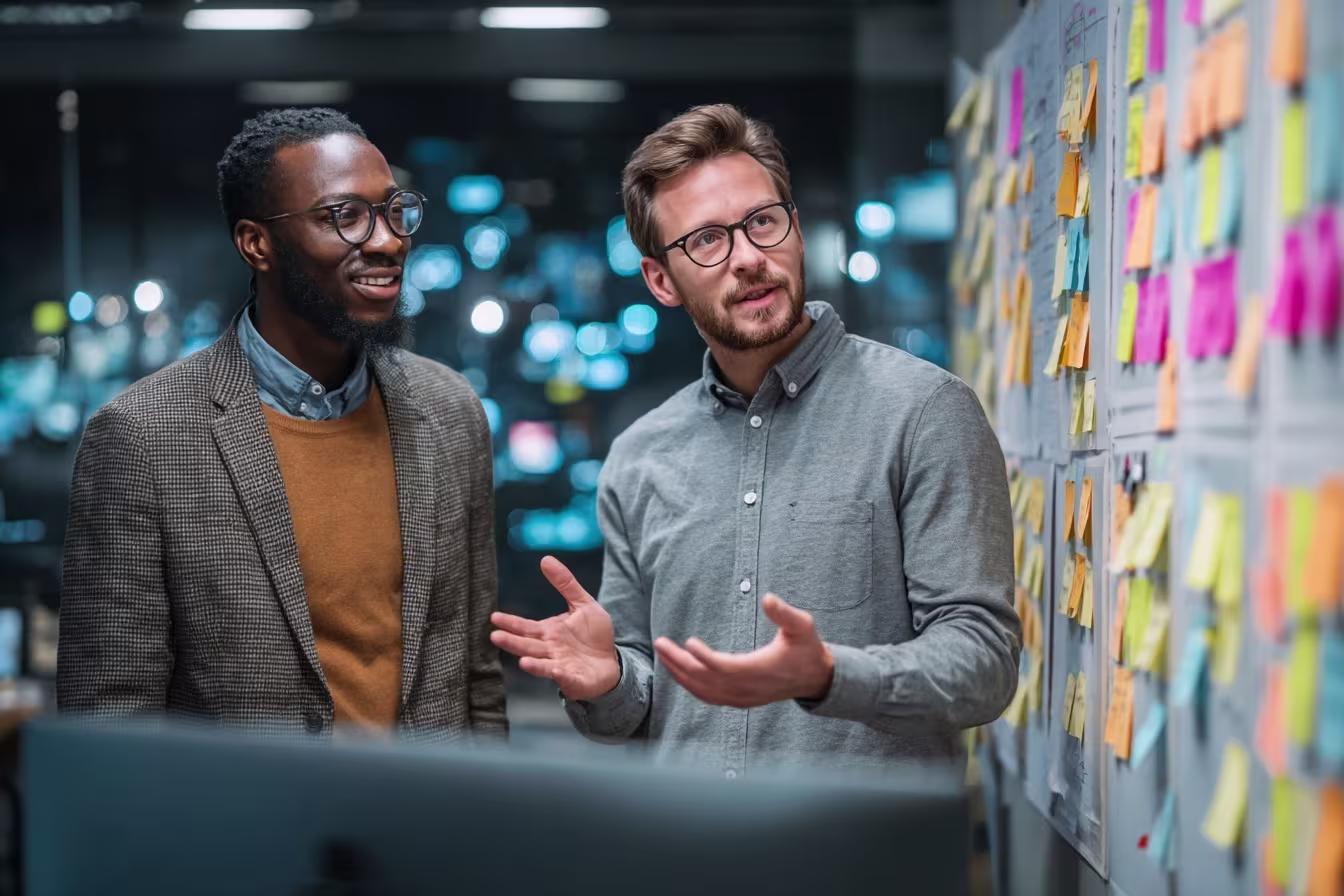 IT professionals discussing project timeline