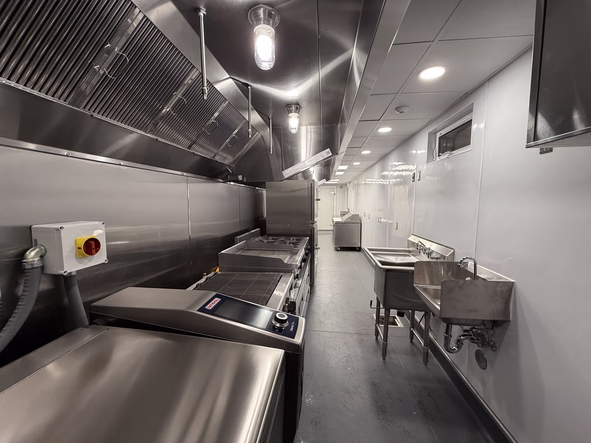 A mobile kitchen trailer interior, fully equipped