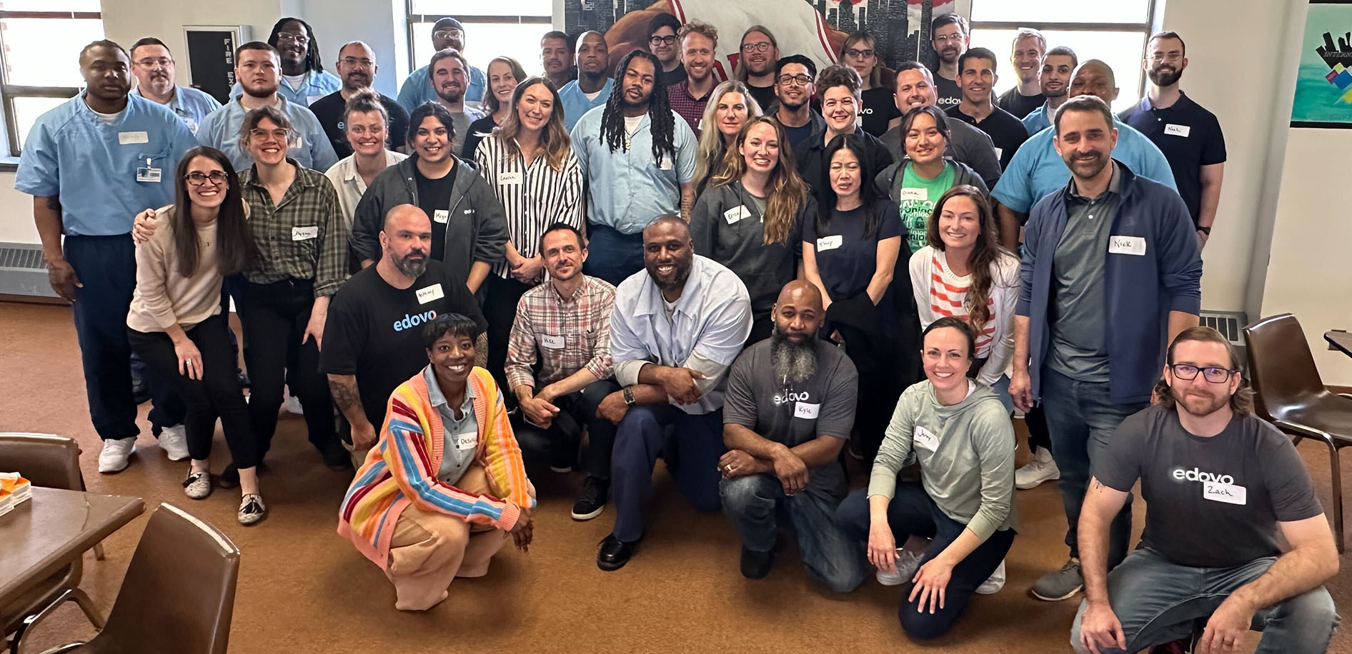 Team picture of edovo employees with Learners at Illinois Correctional facility