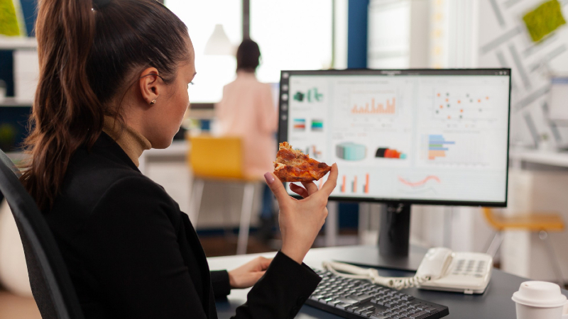 Employees working behind their desk