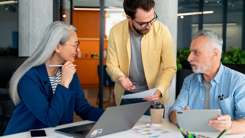 Team of coworkers using buckets of hours approach