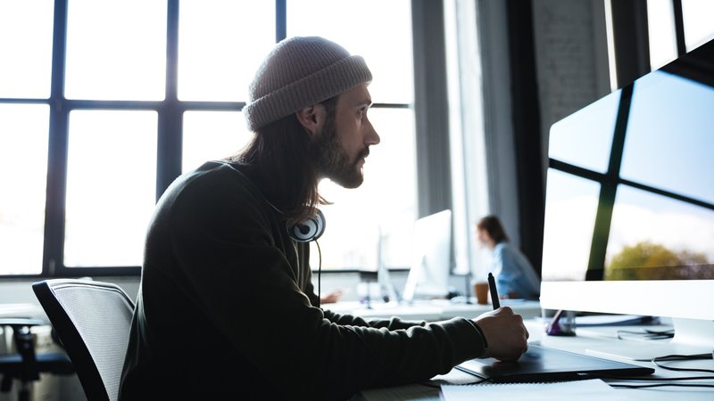 Employee deeply focused on work