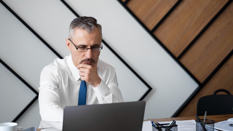 A man being unsure about their time spent on various tasks