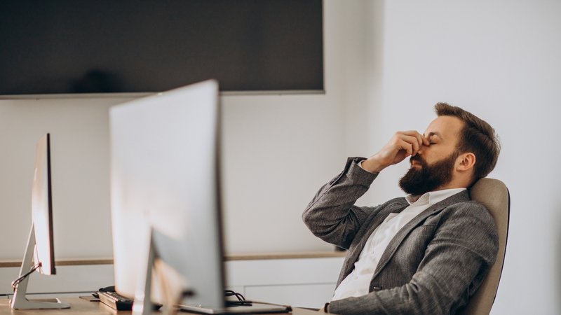 A man feeling drained due to all the invisible work