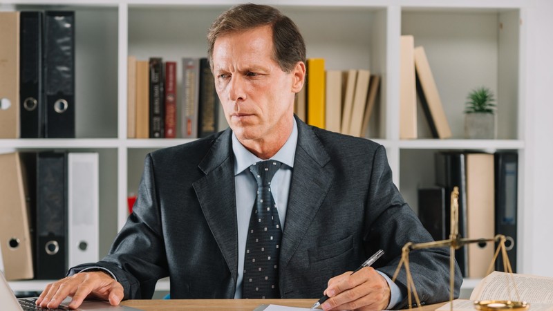 A lawyer calculating their billable hours and utilization rate