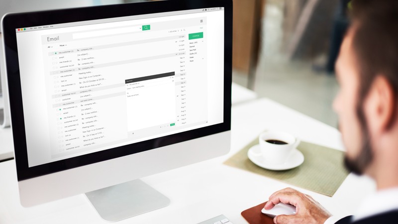 A service business owner receiving an email notification from a potential client requesting a fixed price quote for a project