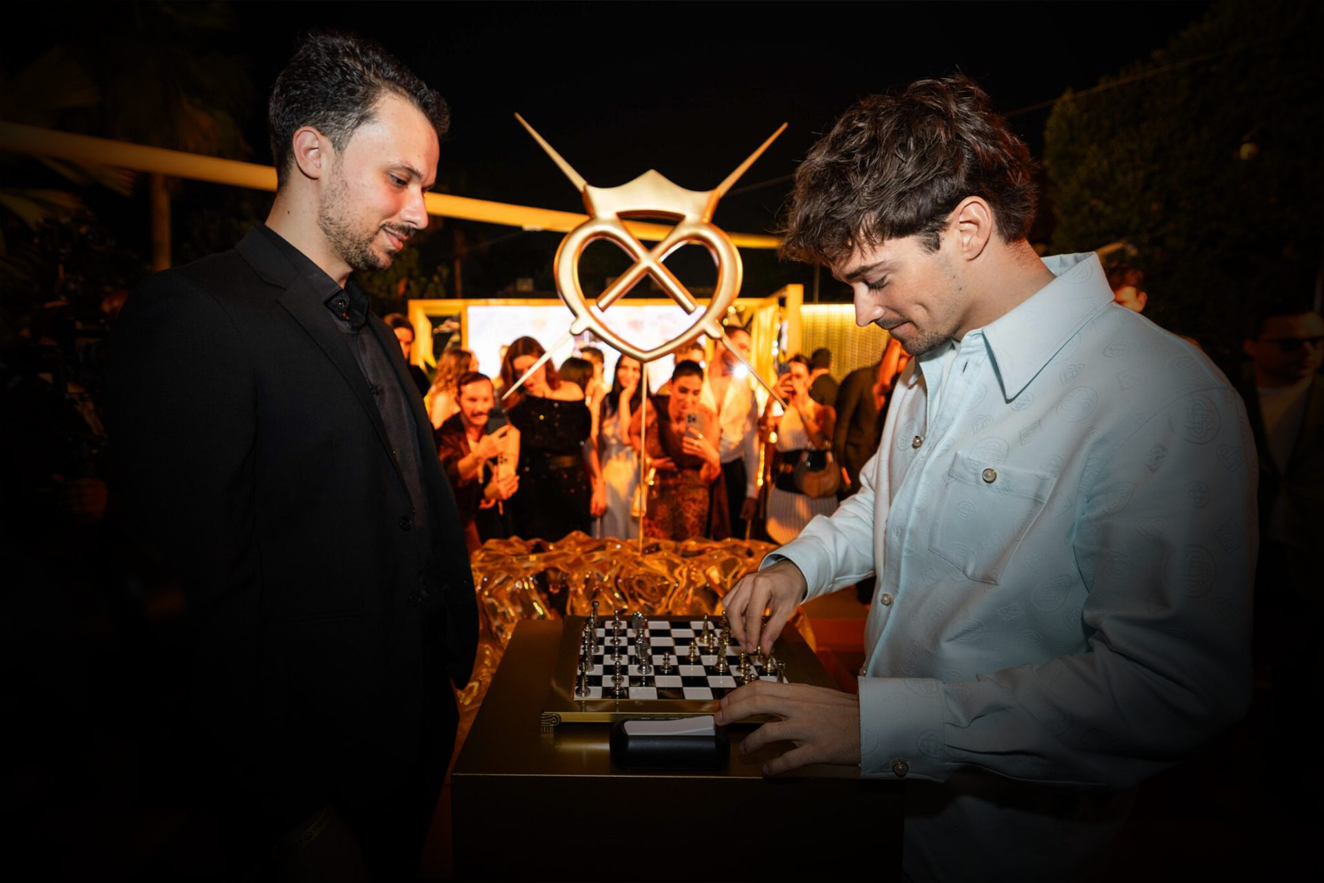 Charles Leclerc plays a FERZ grandmaster at the Chivas Regal Crystal Gold presentation