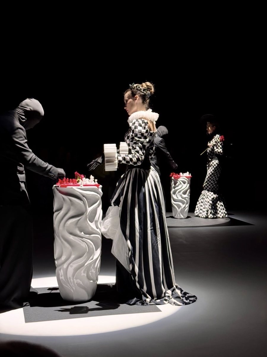 FERZ queen performer in a custom checkered costume on the Fashion Factor catwalk