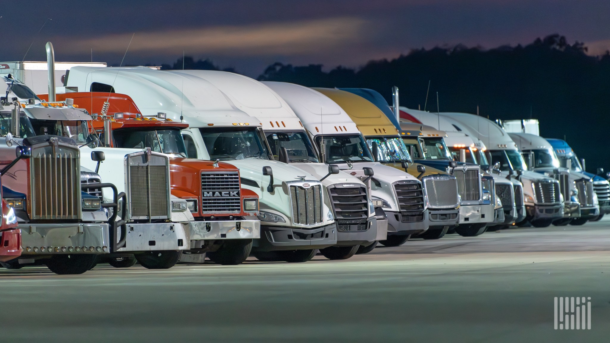 Trucks in parking lot, photo credits to Jim Allen / FreightWaves