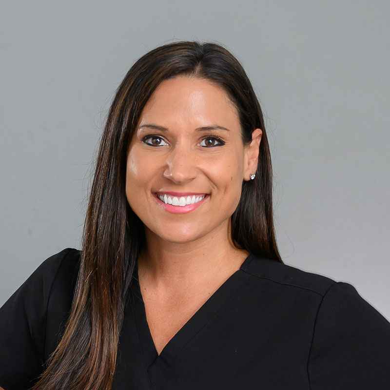 Chiropractor Dr. Dana LeBlanc portrait, smiling.