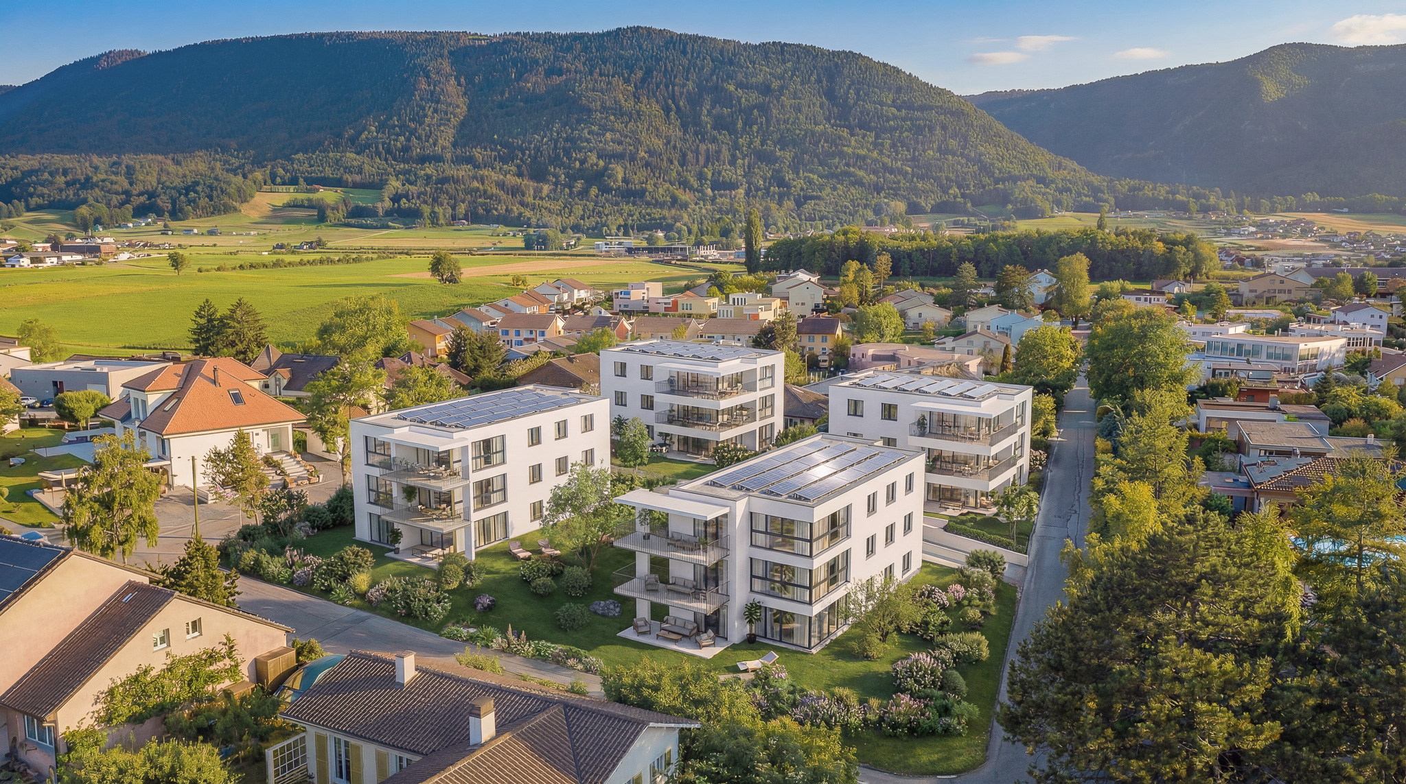 Façade de la résidence La Garde à Cortaillod avec vue sur la nature