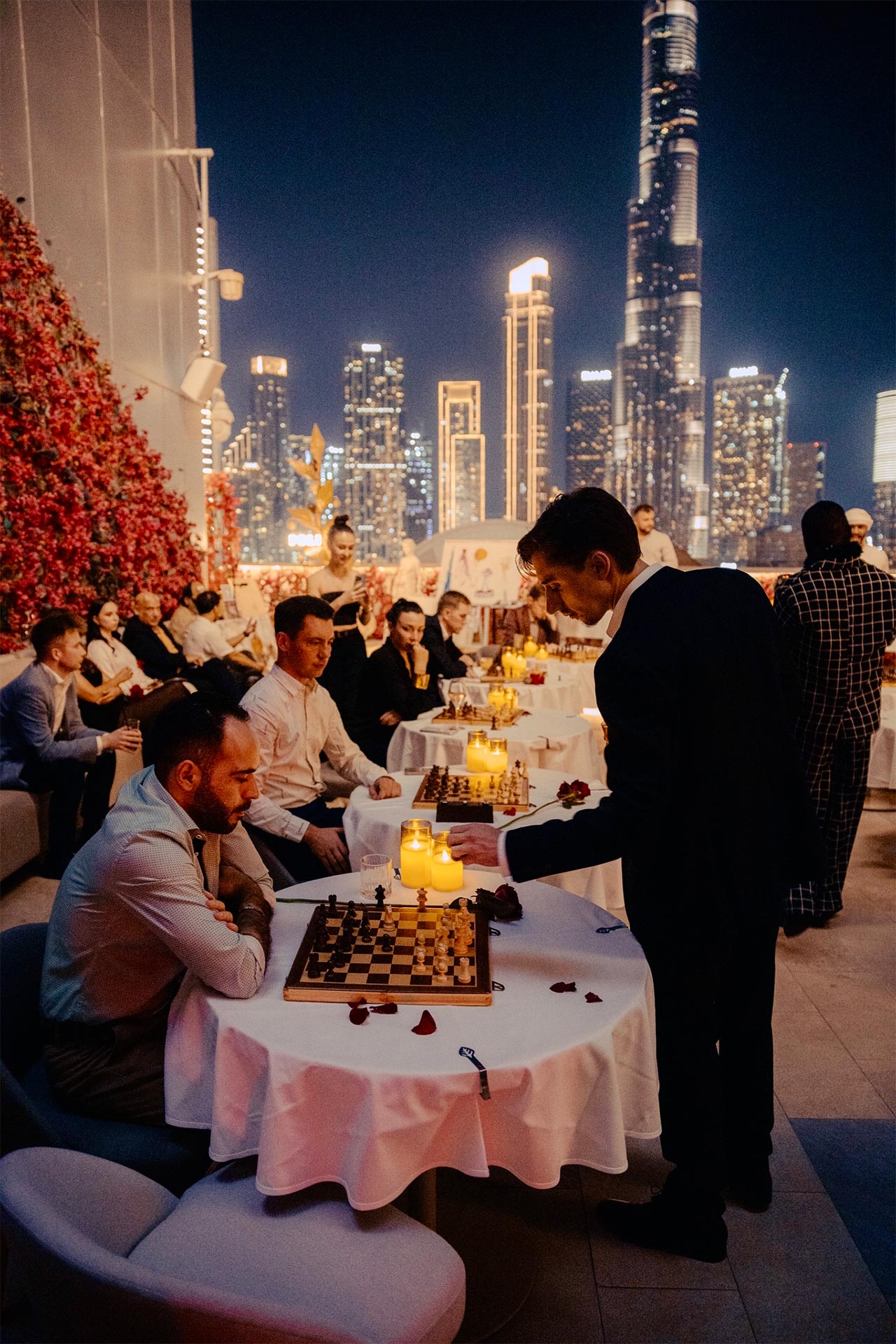 Rooftop chess night by FERZ with the Dubai skyline
