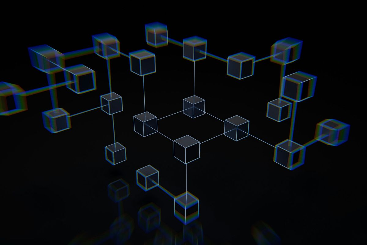 a group of cubes that are on a black surface