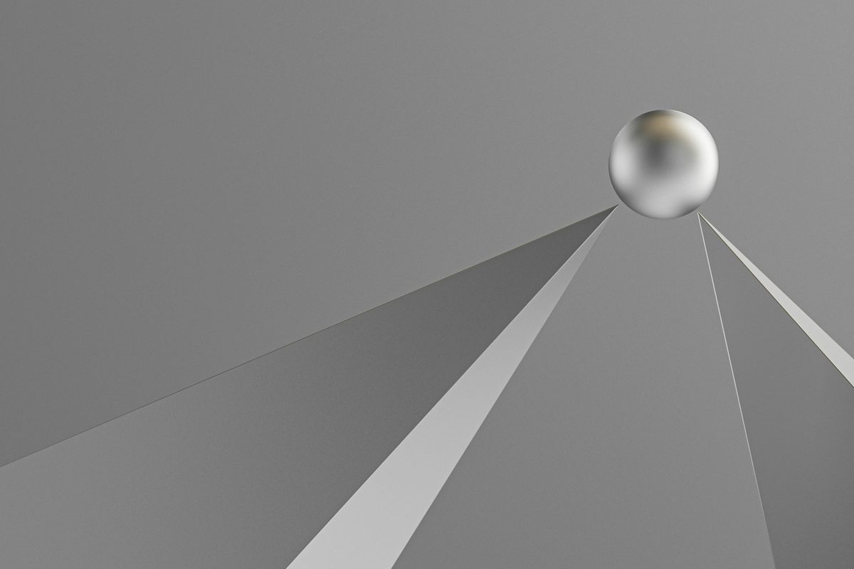 an abstract image of a silver ball in the air