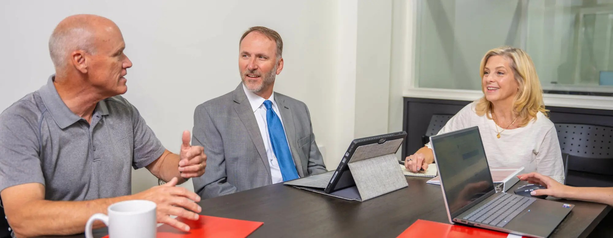 An Ironpeak regional manager explains cyber coverages to representatives of a Member Agency. 